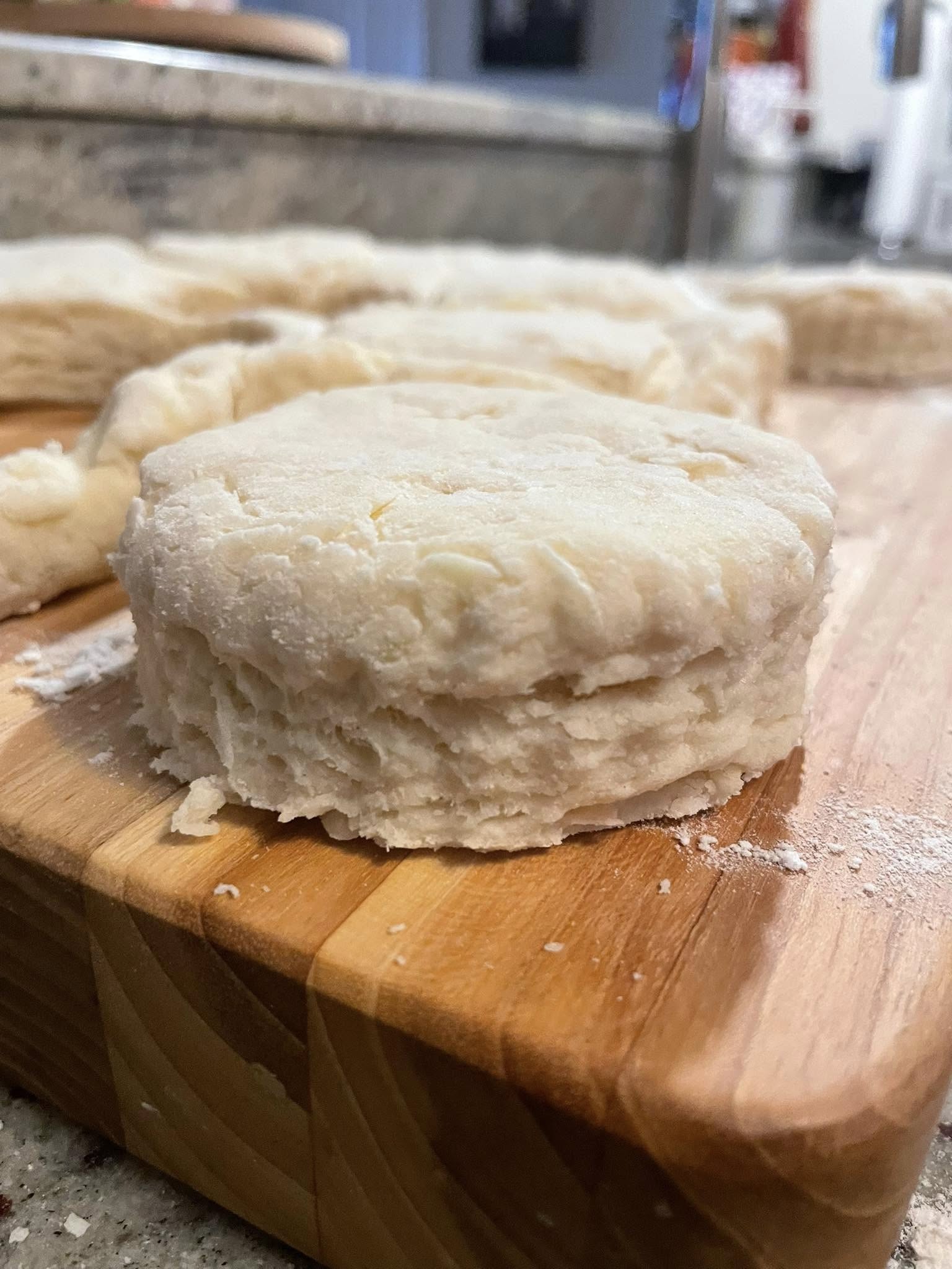 Patting out dough for old-fashioned buttermilk biscuits