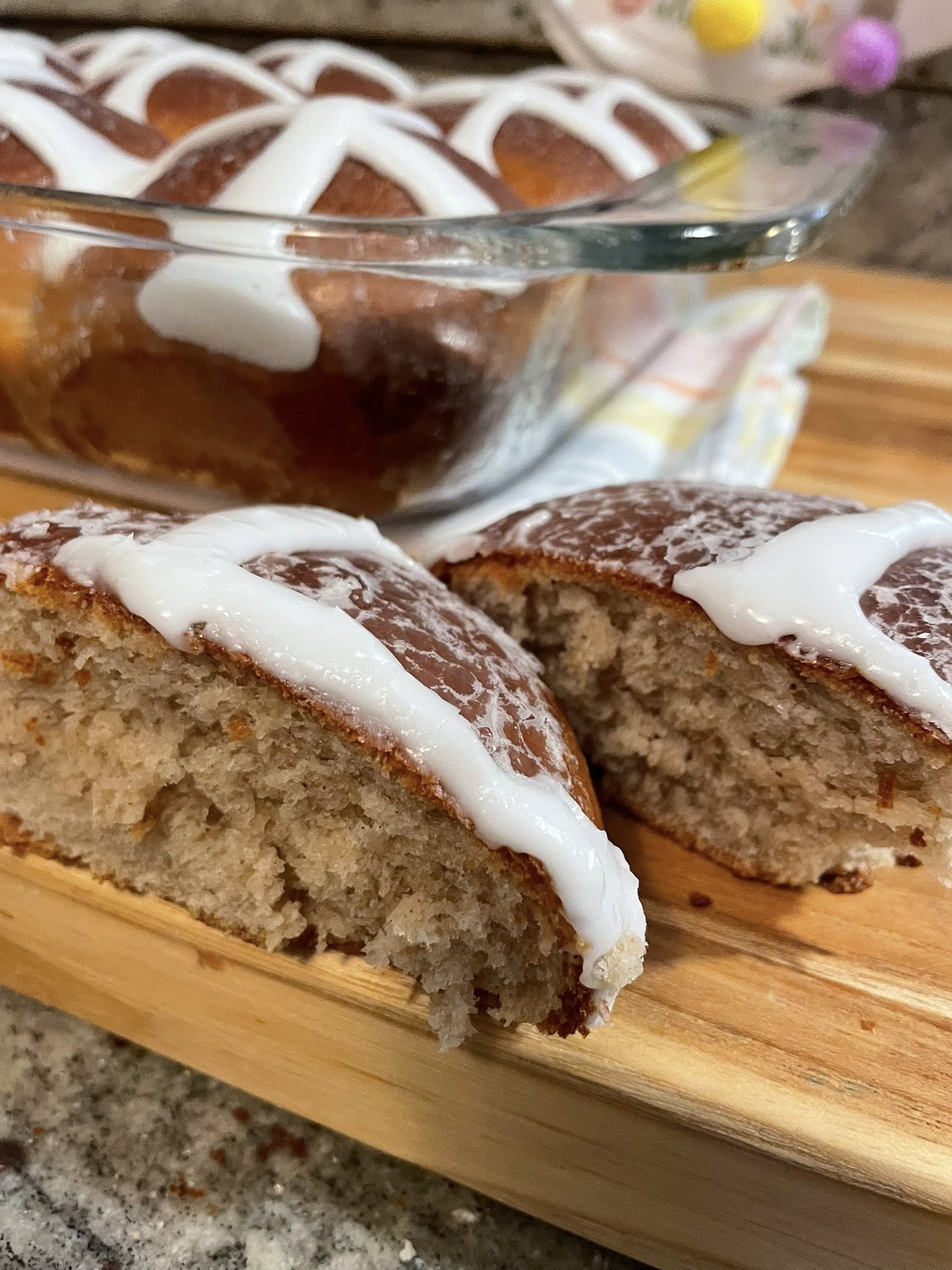 Soft, tender inside of a hot cross bun with icing.